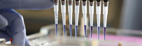 Experiment Tubes with Hand